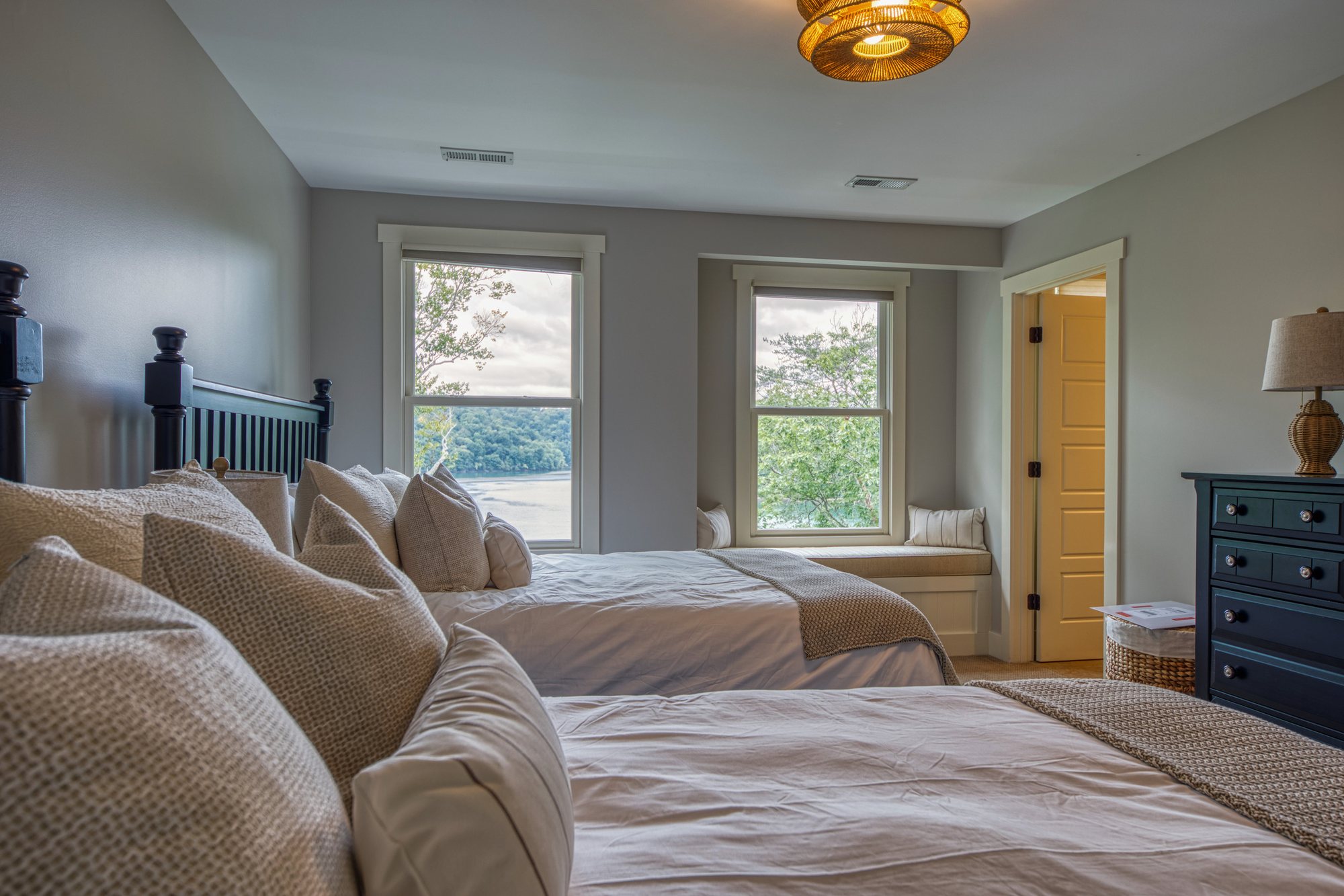 Double queen bedroom with lake views