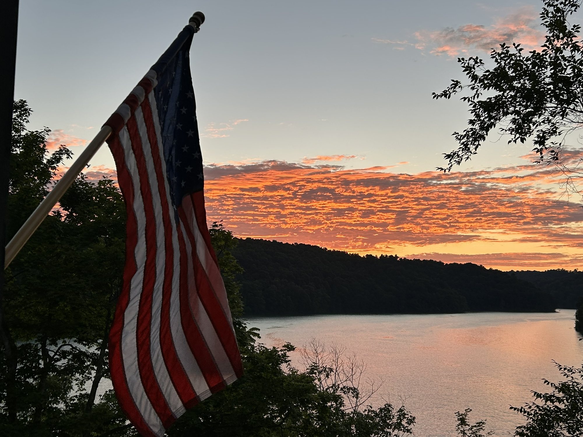 American flag at sunset over Norris Lake from Sunset Pointe