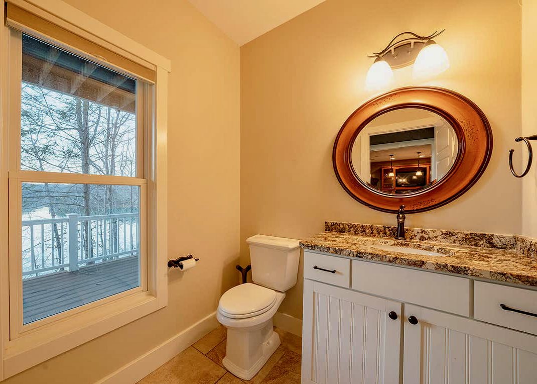 Lower-level powder room, shared with the twin bunk room