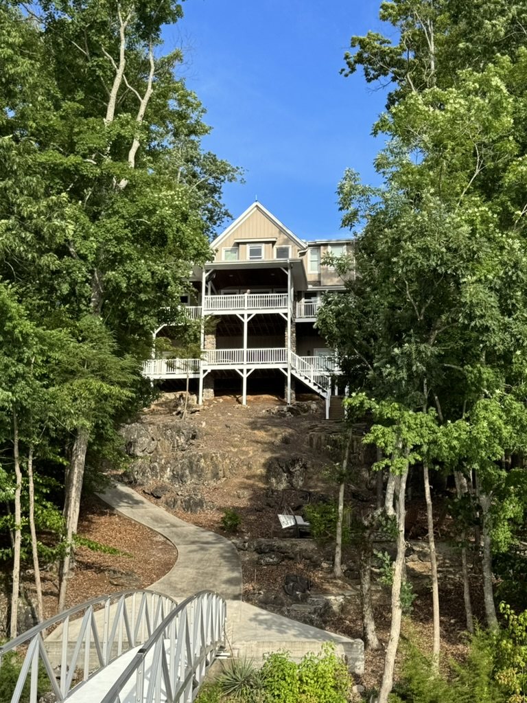 The path and bridge leading up to the house