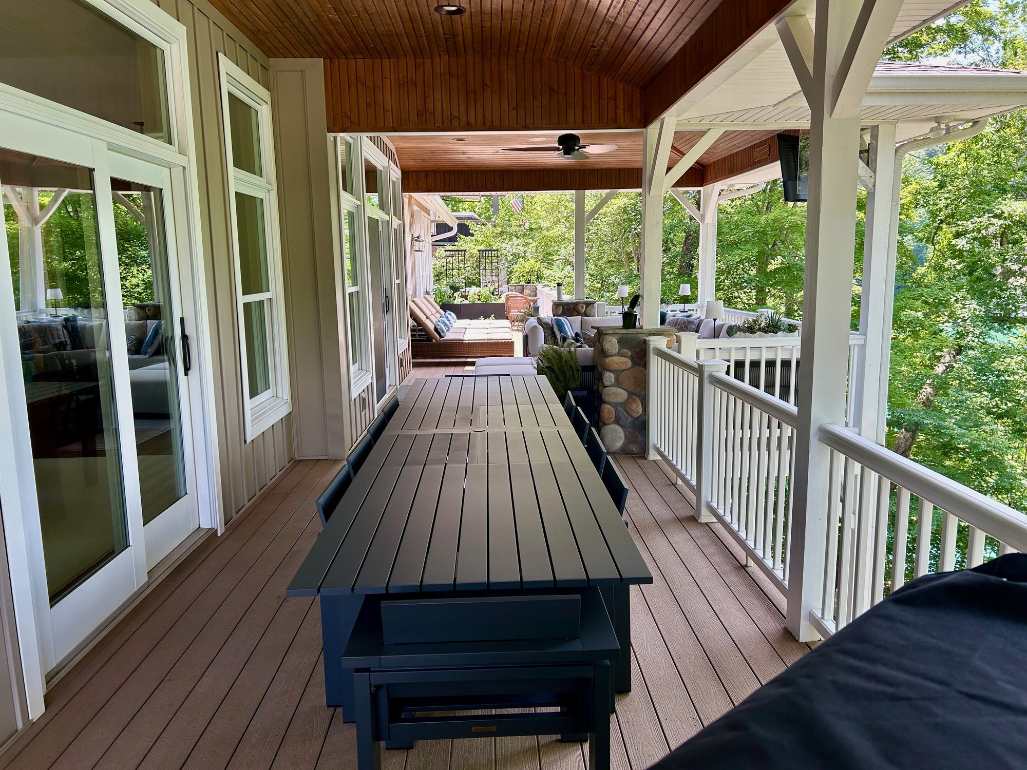 Long dining table on the covered porch