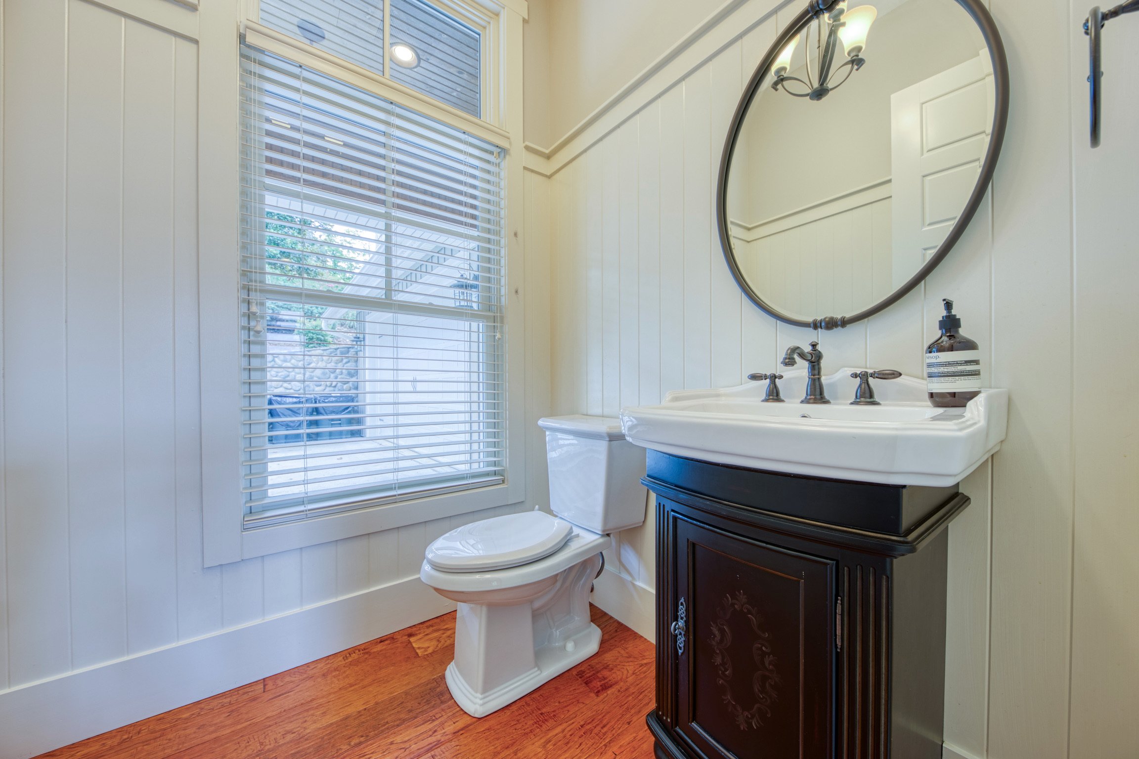 Powder room off the dining room and kitchen