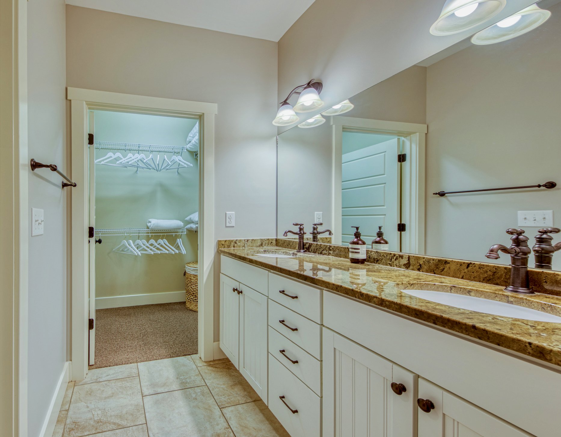 Queen bunk en suite bath with double sinks